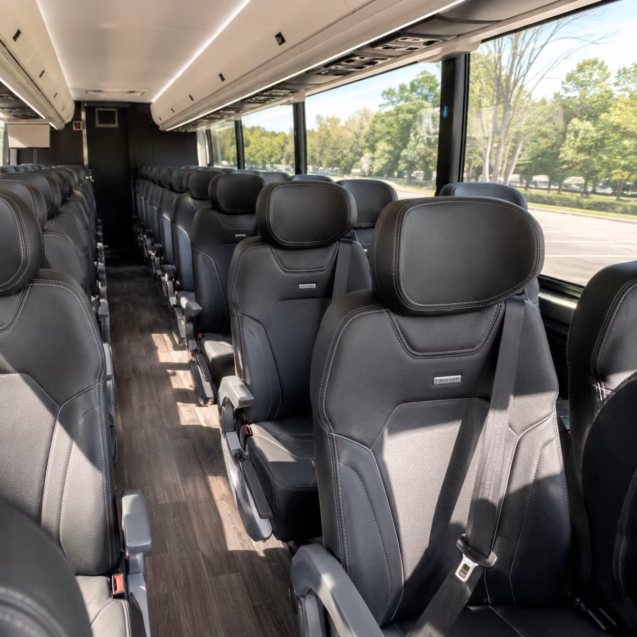 long distance charter buses to lambeau field and fiserv forum from coon rapids